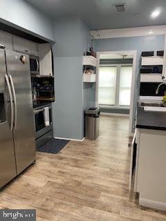 465 Prospect Road Springfield, PA 19064 - Photo 7 of 19 kitchen leads to family room