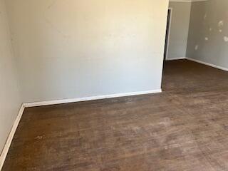 2106 35th Street Lubbock, TX 79412 - Photo 11 of 20 an empty room with a bench