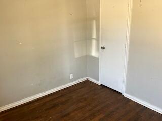 2106 35th Street Lubbock, TX 79412 - Photo 15 of 20 an empty room with wooden floor