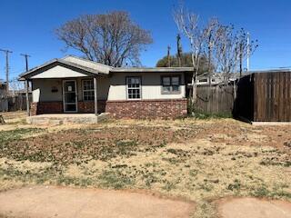 2106 35th Street Lubbock, TX 79412 - Photo 19 of 20 a view of a house with a yard