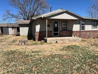 2106 35th Street Lubbock, TX 79412 - Photo 20 of 20 a view of a house with a yard covered in snow