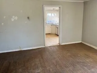 an empty room with a bench