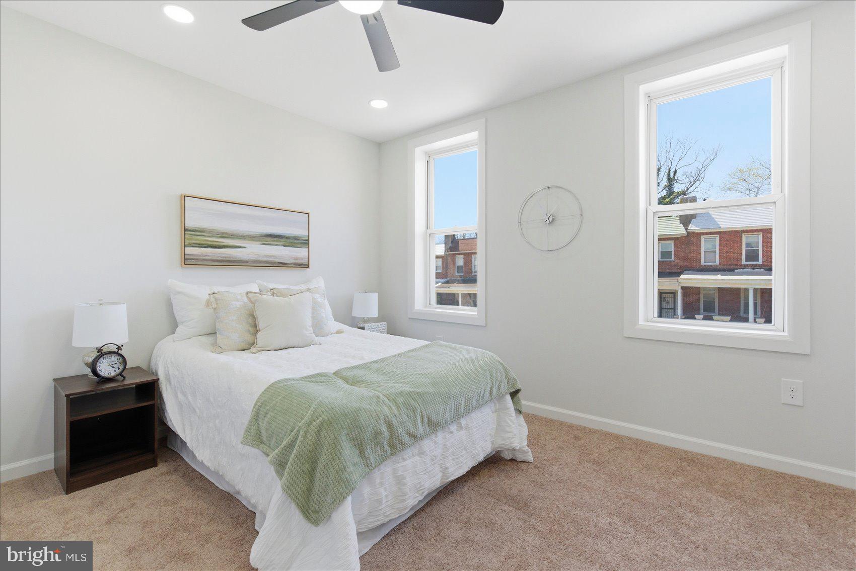 2009 Ruxton Avenue Baltimore, MD 21216 - Photo 19 of 37 a bedroom with a bed and a window