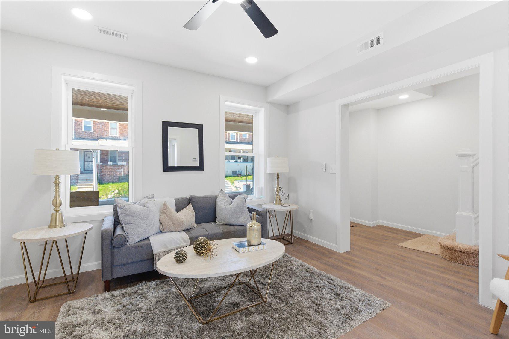 2009 Ruxton Avenue Baltimore, MD 21216 - Photo 3 of 37 a living room with furniture and a wooden floor