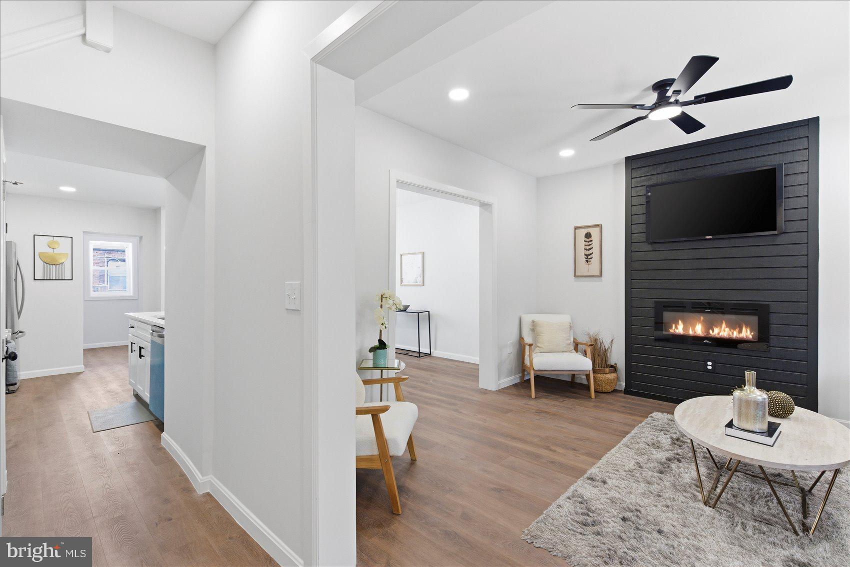 2009 Ruxton Avenue Baltimore, MD 21216 - Photo 4 of 37 a living room with furniture and a fireplace
