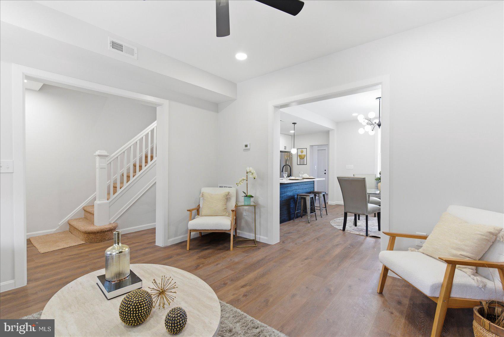 2009 Ruxton Avenue Baltimore, MD 21216 - Photo 5 of 37 a living room with furniture and a chair