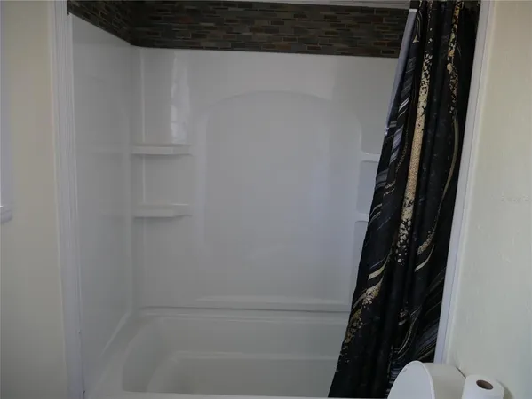 a bathroom with a bathtub