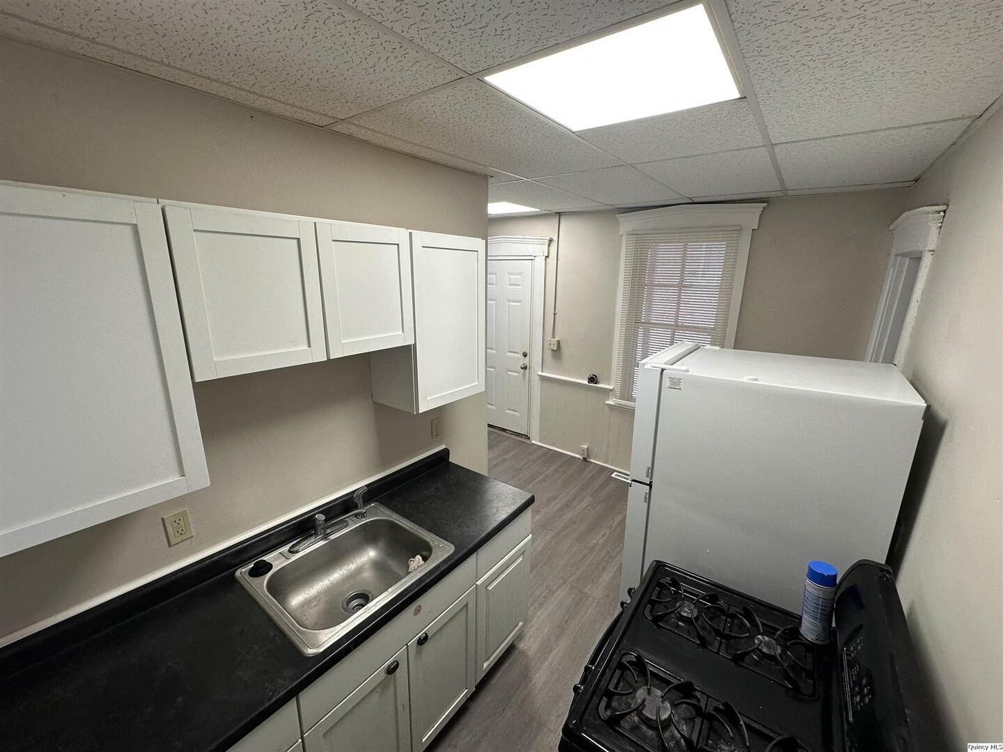 812 North 7th Street Quincy, IL 62301 - Photo 11 of 18 a room with storage and utility