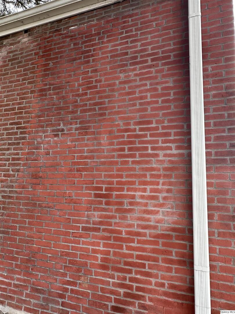 812 North 7th Street Quincy, IL 62301 - Photo 15 of 18 a brick wall with a window