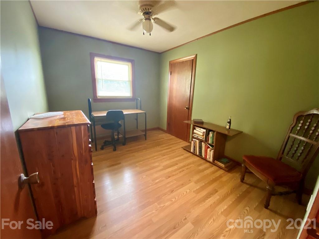 127 Countryside Road Harmony, NC 28634 - Photo 14 of 27 a bedroom with furniture and a window