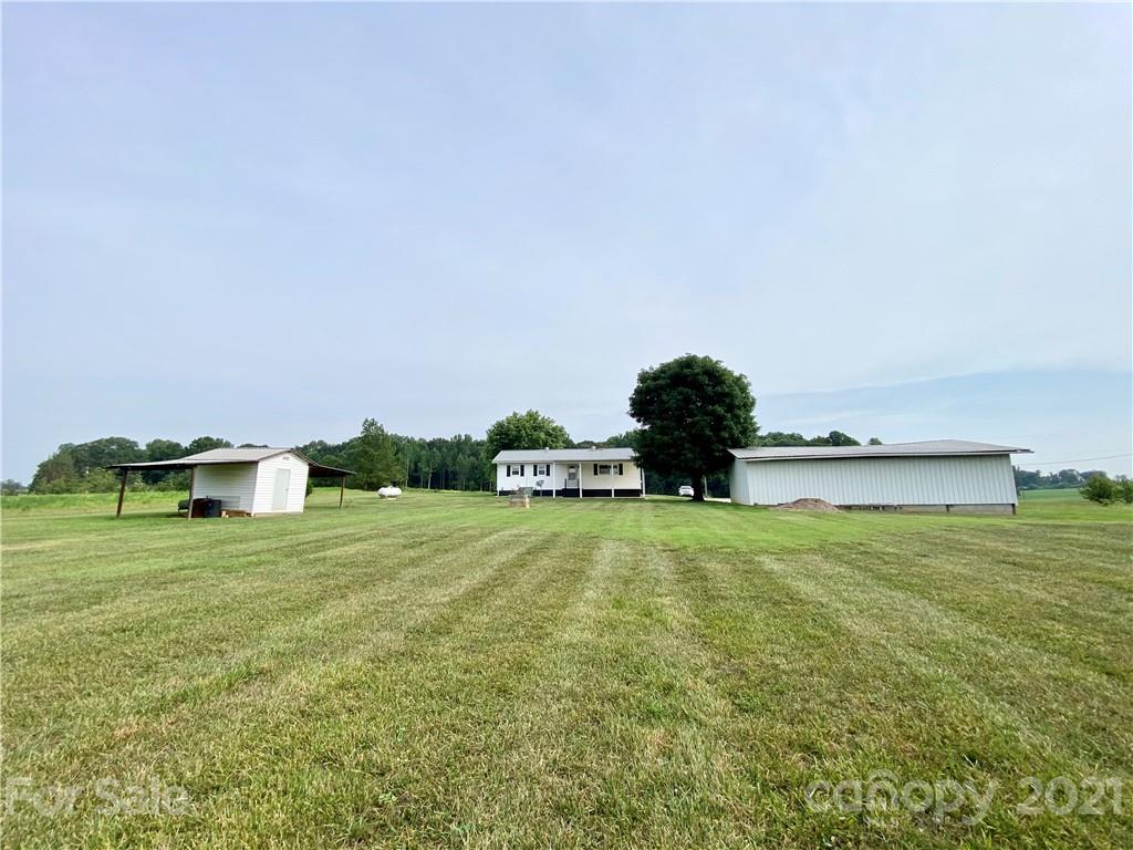 127 Countryside Road Harmony, NC 28634 - Photo 23 of 27 a view of a grassy field
