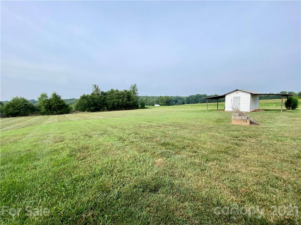 127 Countryside Road Harmony, NC 28634 - Photo 24 of 27 a view of a lake view