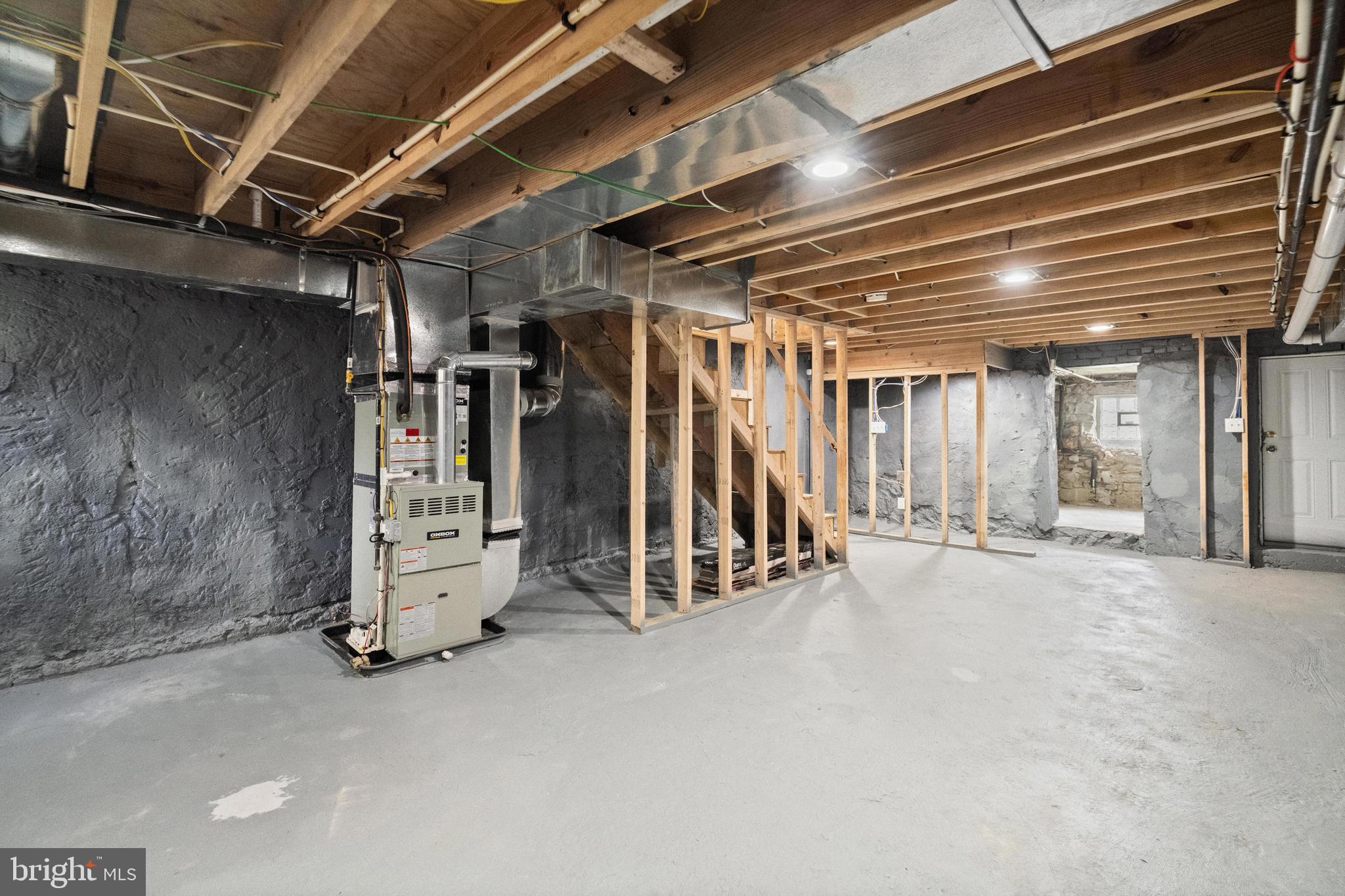 2815 West Cold Spring Lane Baltimore, MD 21215 - Photo 25 of 37 a view of an empty room with wooden walls