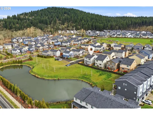 a view of a swimming pool with a lake view