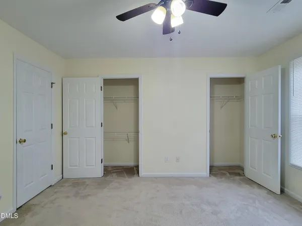 an empty room with a bathroom