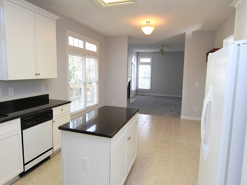 9021 Breeland Way Raleigh, NC 27613 - Photo 9 of 20 Family time in this expansive area lends itself to fun..fun..fun! Easily will accommodate those more casual entertaining gatherings ala Super Bowl or ACC tournament! Kitchen/family area