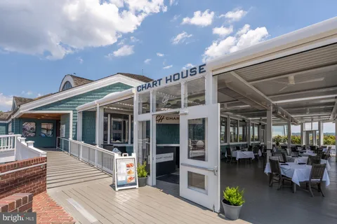 a view of a building with sitting area