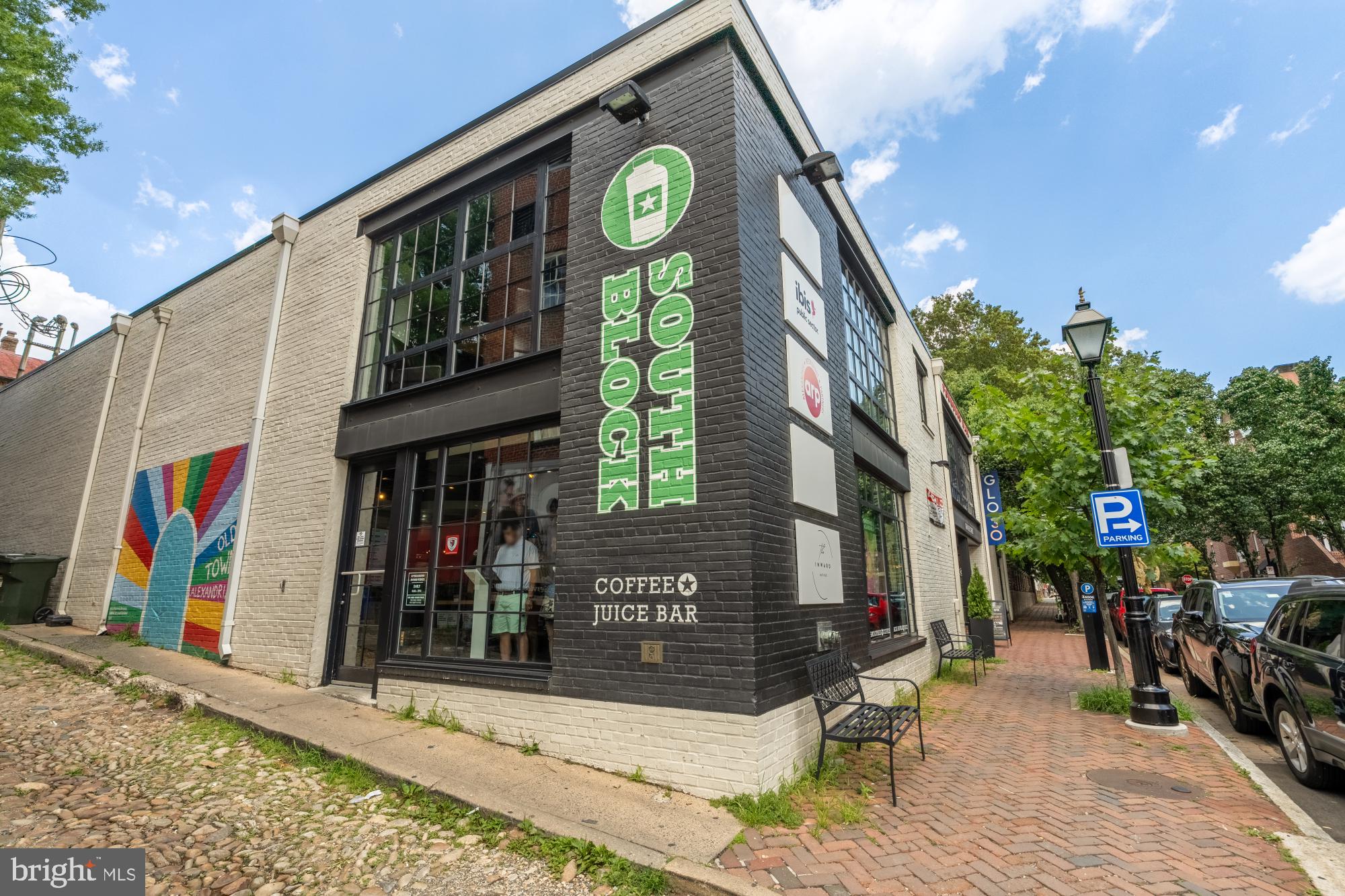 110 Cameron Street, Unit CS102 Alexandria, VA 22314 - Photo 22 of 24 a view of path along with retail shop and buildings