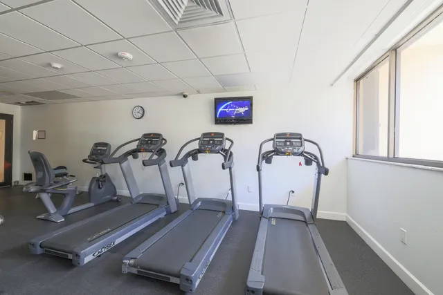 a view of a room with gym equipment
