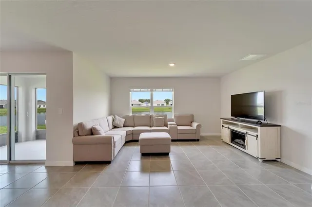 a living room with furniture and a couch