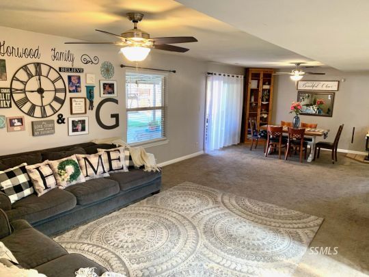 217 Rancho Street Ridgecrest, CA 93555 - Photo 5 of 25 a bedroom with a bed and window