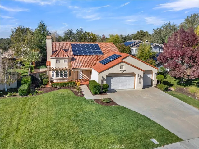 a house view with a garden space