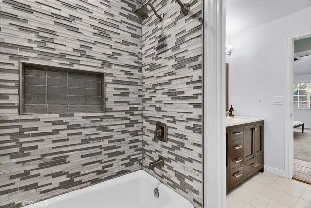 a bathroom with a sink and a shower