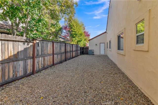 a view of a backyard of the house