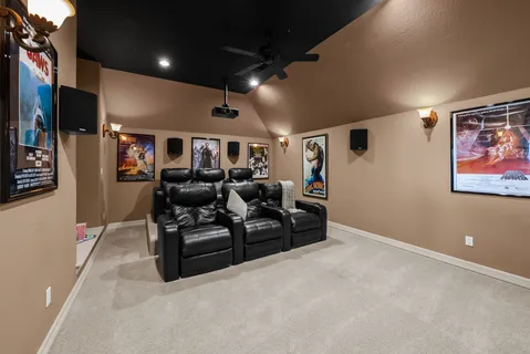 a view of a livingroom with furniture and a flat screen tv