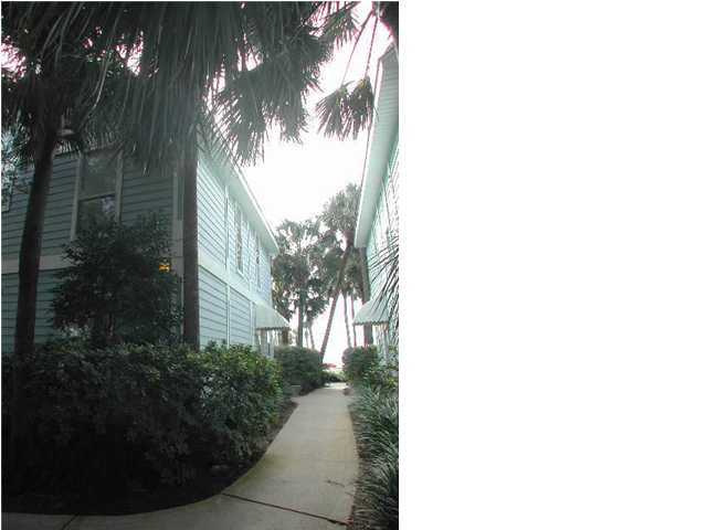 Nantucket Cottage, Unit 6 Destin, FL 32541 - Photo 10 of 10 a view of a house with a yard