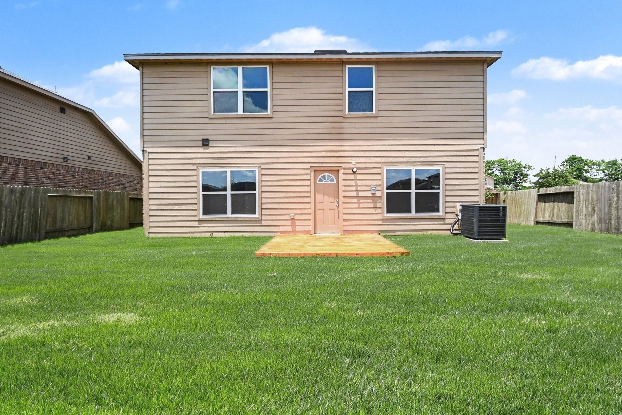 1322 Diamond Drape Drive Rosharon, TX 77583 - Photo 35 of 45 a house view with a garden space