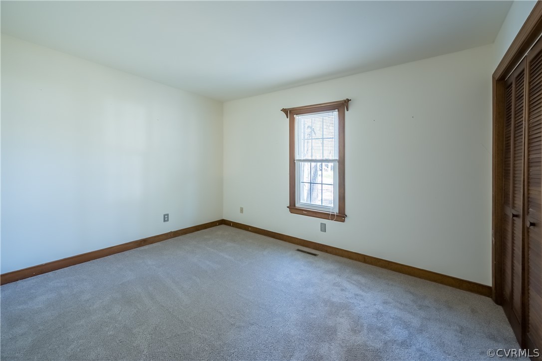 5012 Rollingway Road Chesterfield, VA 23832 - Photo 29 of 35 an empty room with windows
