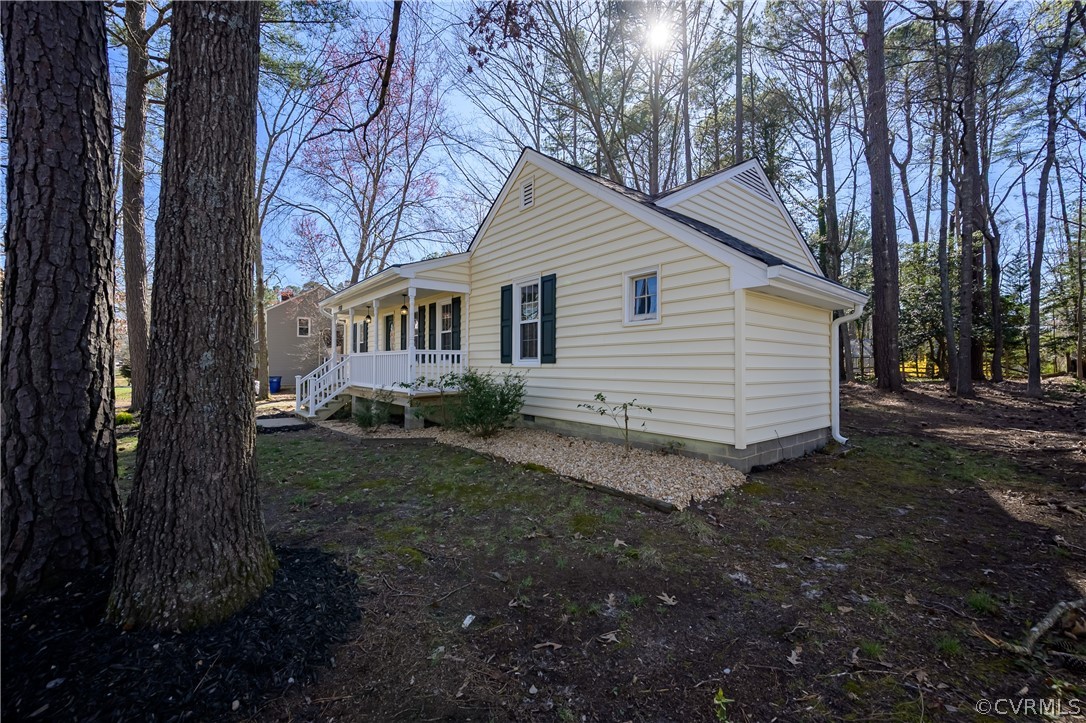 5012 Rollingway Road Chesterfield, VA 23832 - Photo 4 of 35 a view of a house with backyard and trees