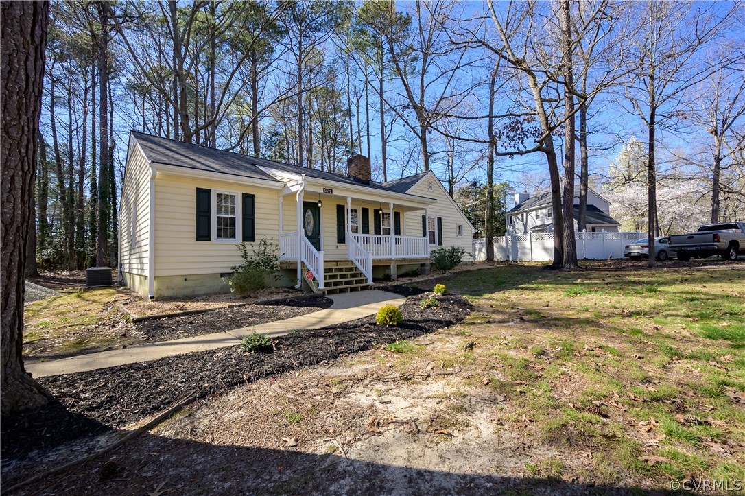 5012 Rollingway Road Chesterfield, VA 23832 - Photo 5 of 35 a house that has a tree in front of it