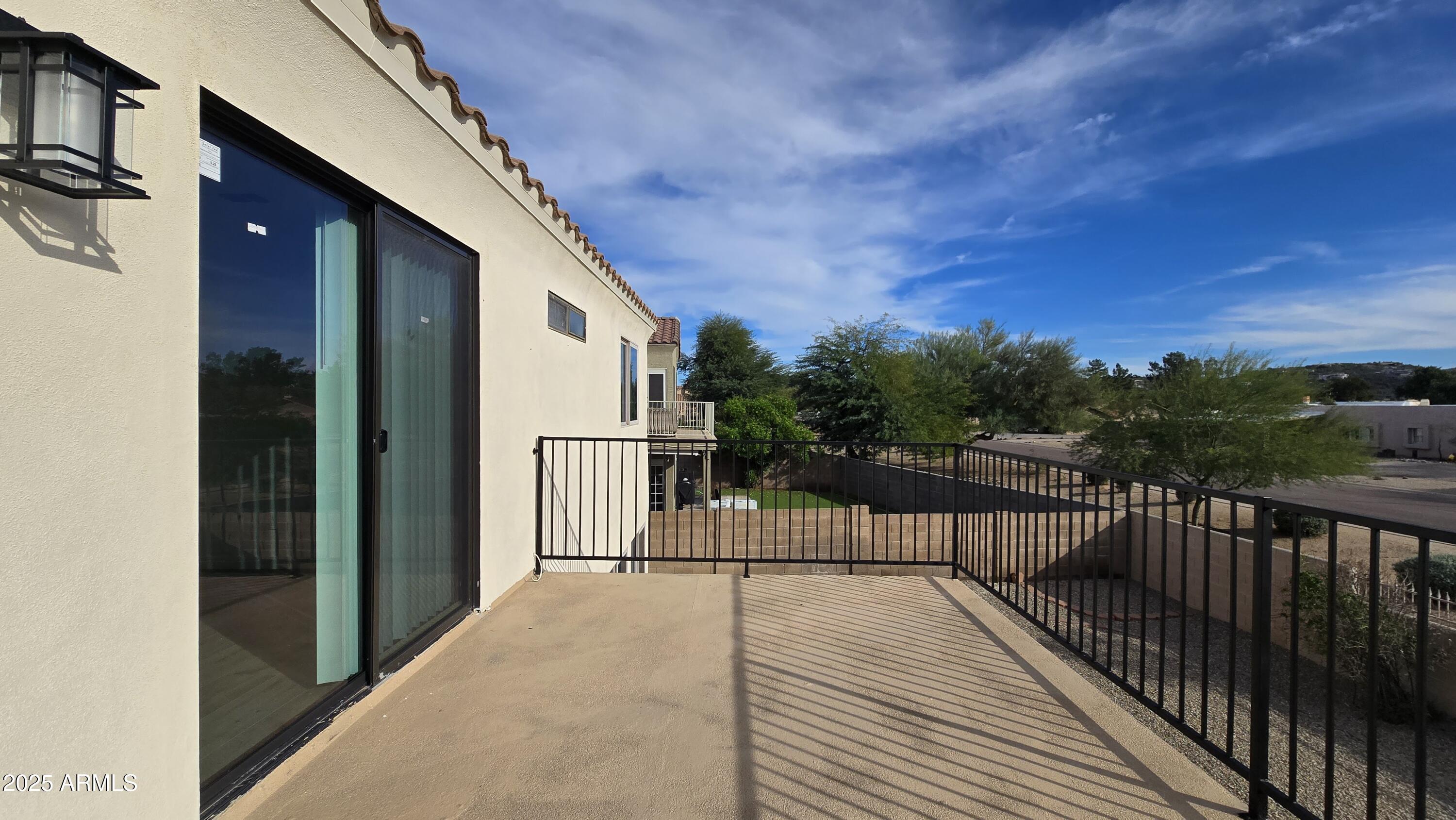 2119 West Tracy Lane Phoenix, AZ 85023 - Photo 17 of 31 a view of a house with a balcony