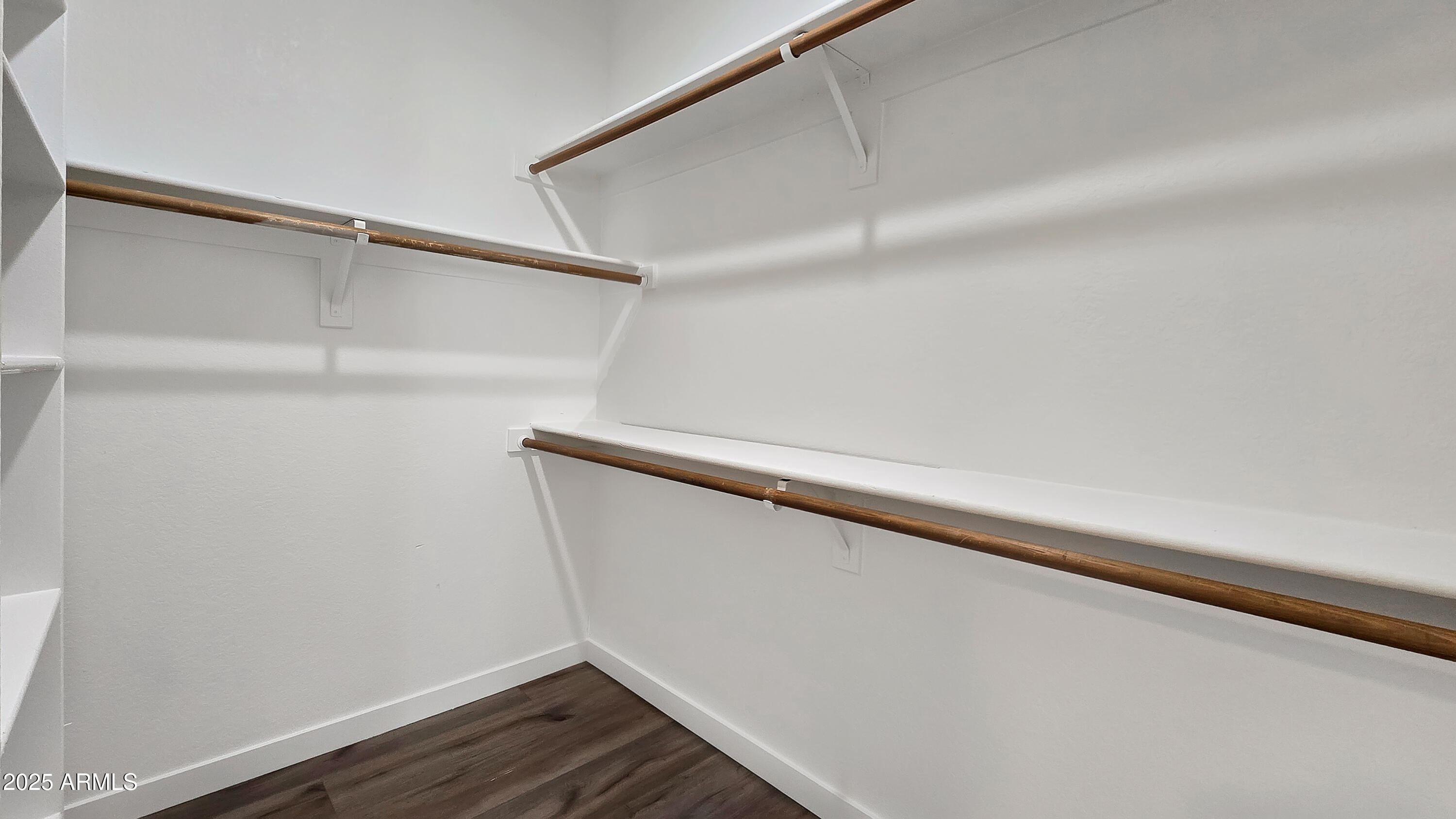 2119 West Tracy Lane Phoenix, AZ 85023 - Photo 23 of 31 a view of small space with racks on the wall