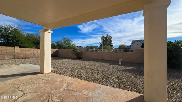 a view of backyard with green space