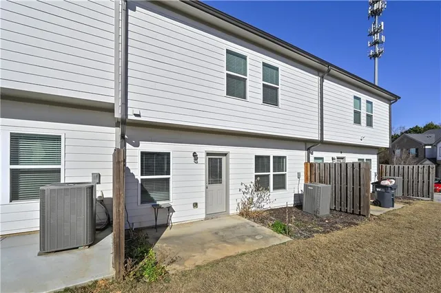 a front view of a house with a garage