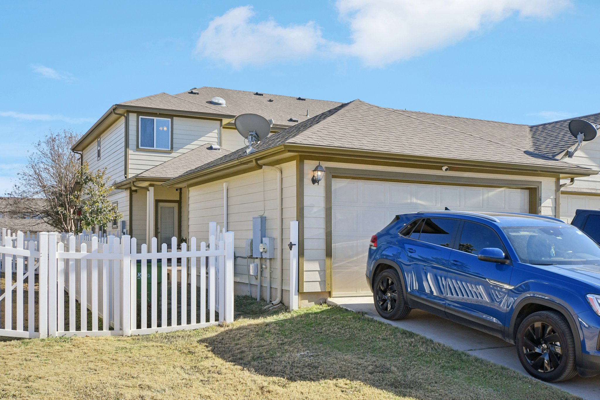 616 Lookout Tree Lane Round Rock, TX 78664 - Photo 29 of 39 View of side of home with a garage, roof with shingles, and concrete driveway