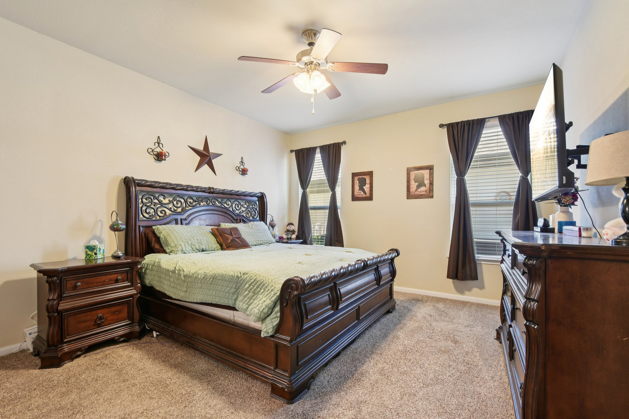 616 Lookout Tree Lane Round Rock, TX 78664 - Photo 10 of 39 Bedroom with light colored carpet and ceiling fan