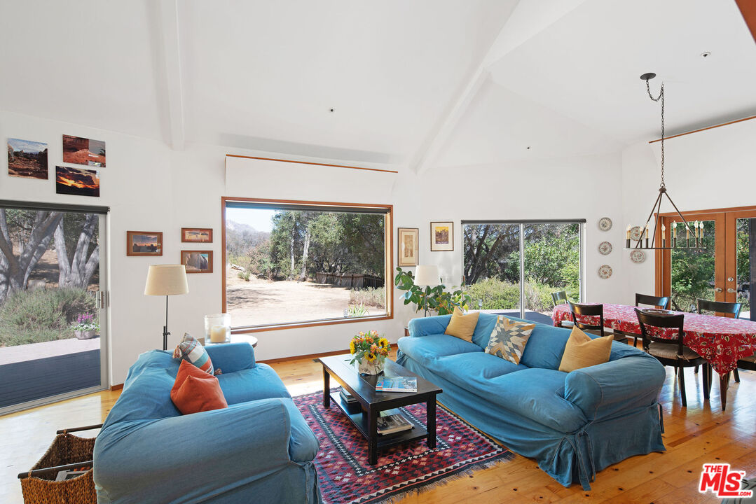 25830 Piuma Road Calabasas, CA 91302 - Photo 11 of 34 a living room with furniture and a large window