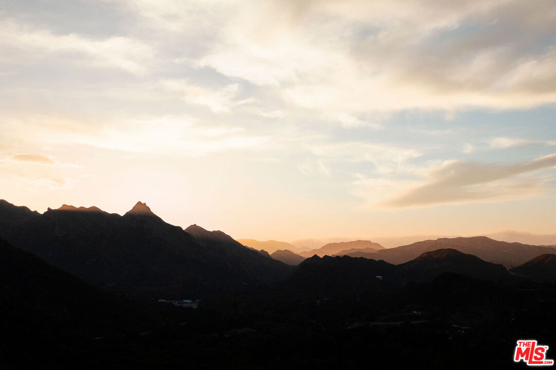 25830 Piuma Road Calabasas, CA 91302 - Photo 33 of 34 a view of mountains in the middle of a city