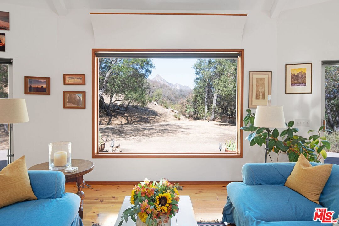 25830 Piuma Road Calabasas, CA 91302 - Photo 10 of 34 a living room with furniture and a large window