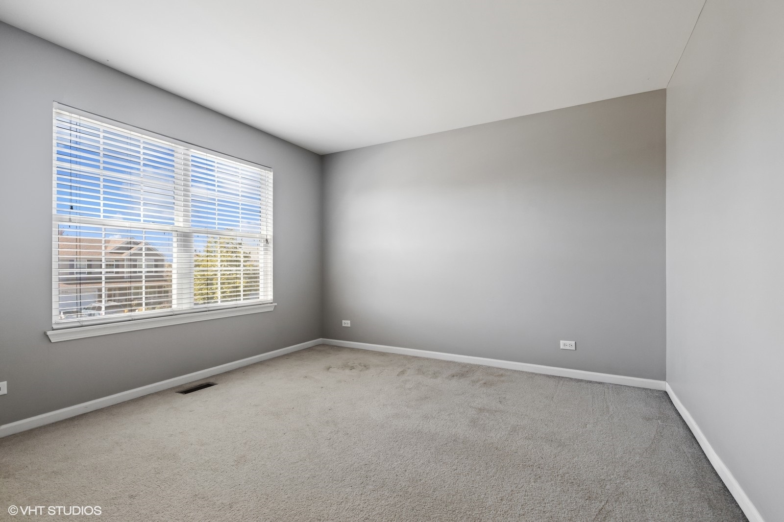 9740 Newton Road Huntley, IL 60142 - Photo 14 of 20 a view of an empty room with a window