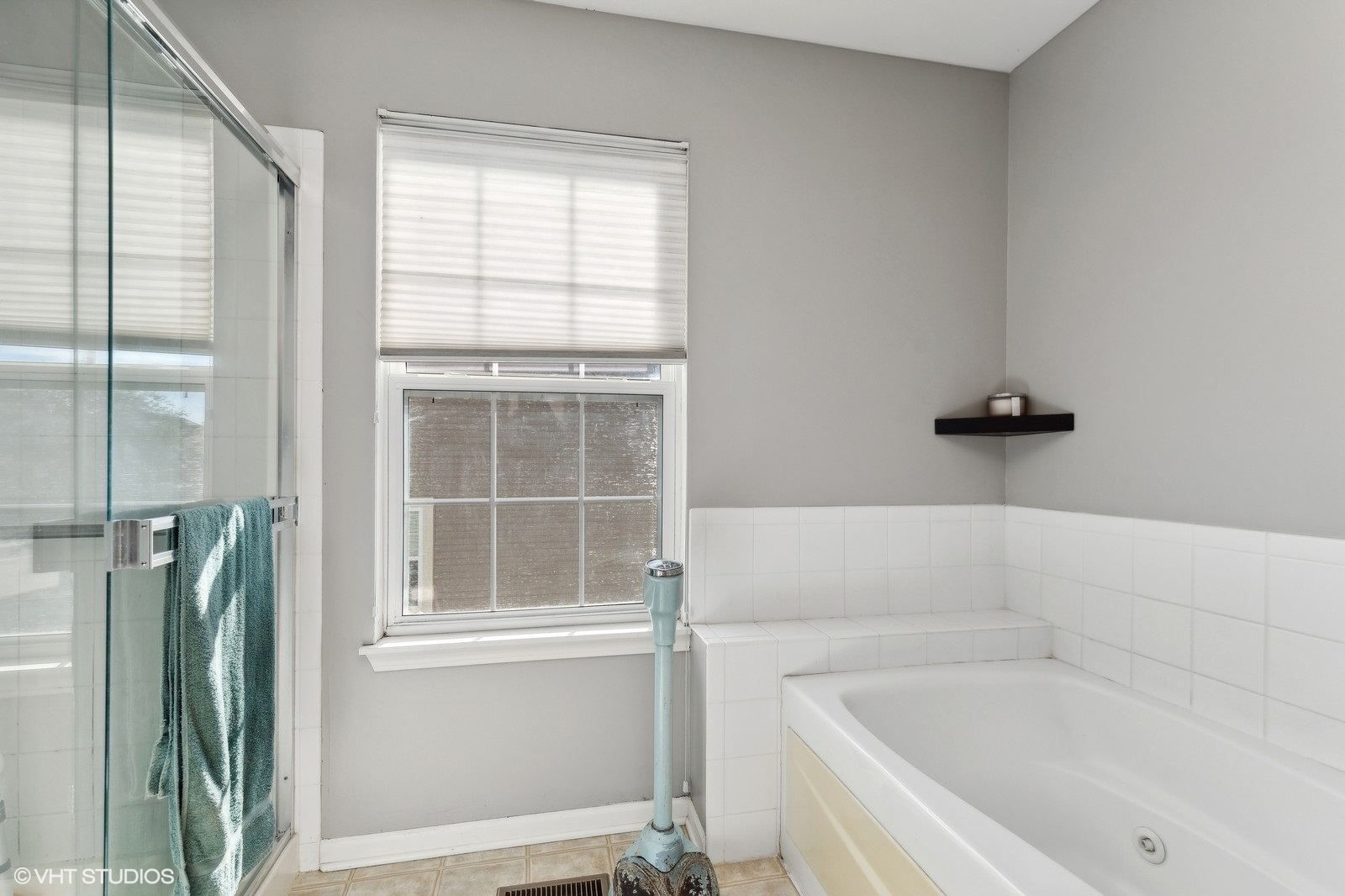 9740 Newton Road Huntley, IL 60142 - Photo 20 of 20 a white bath tub sitting next to a window