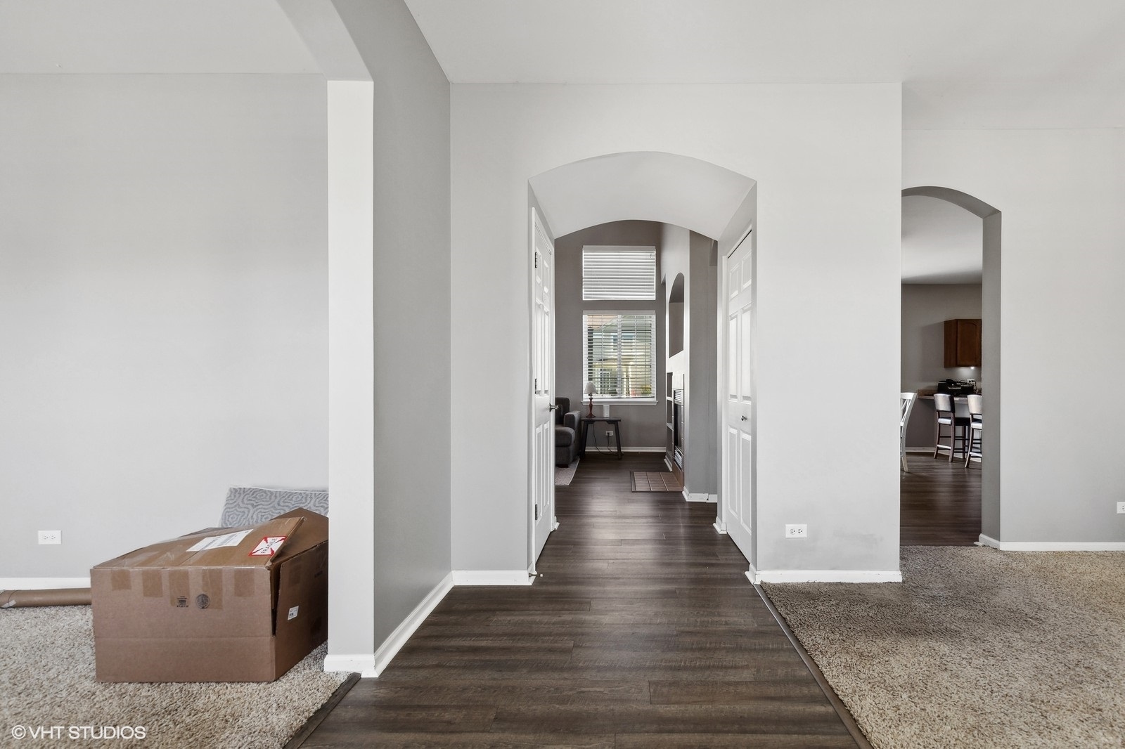 9740 Newton Road Huntley, IL 60142 - Photo 4 of 20 wooden floor in a hall with a window