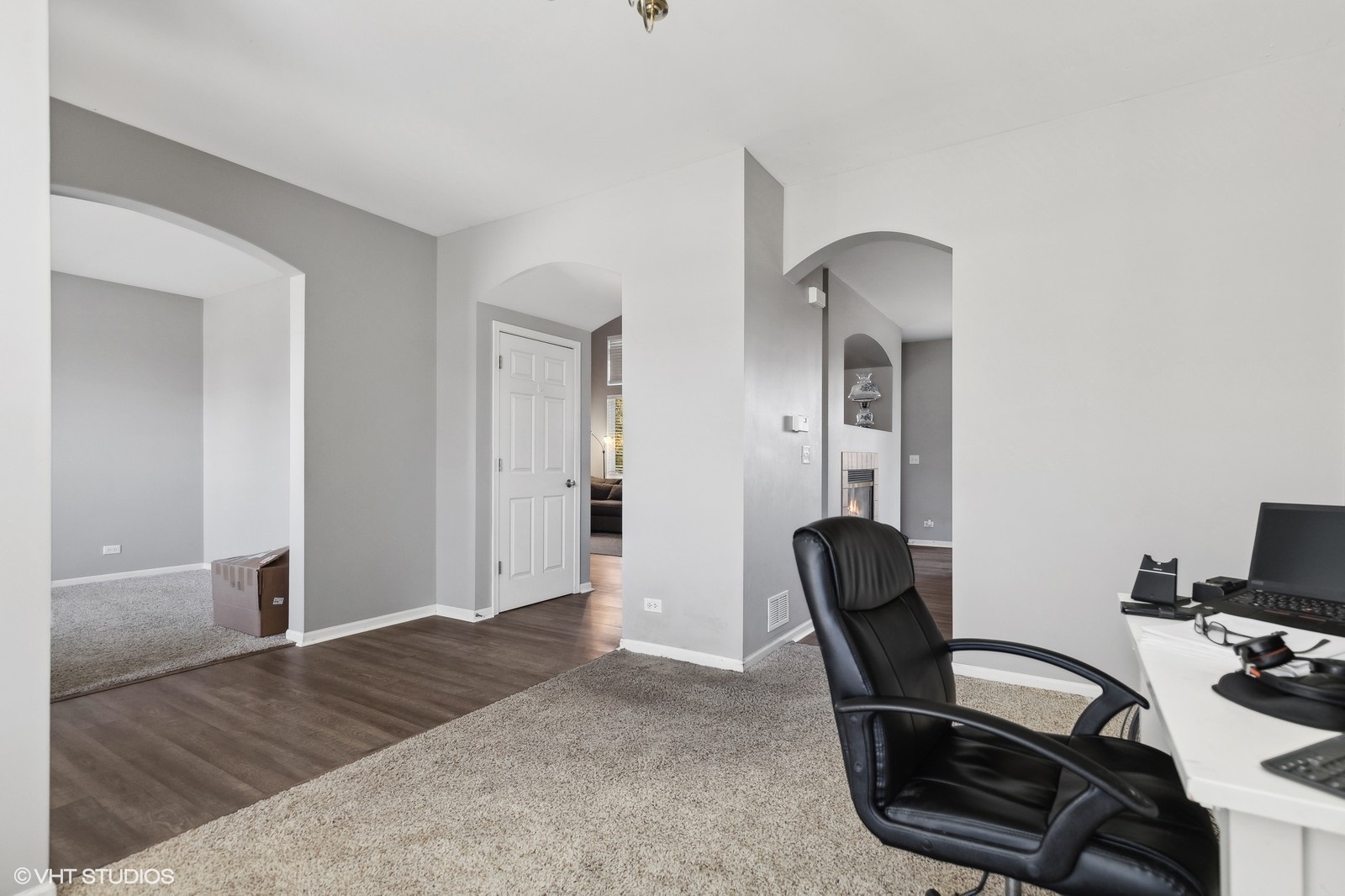 9740 Newton Road Huntley, IL 60142 - Photo 6 of 20 a view of a workspace with furniture and gym equipment