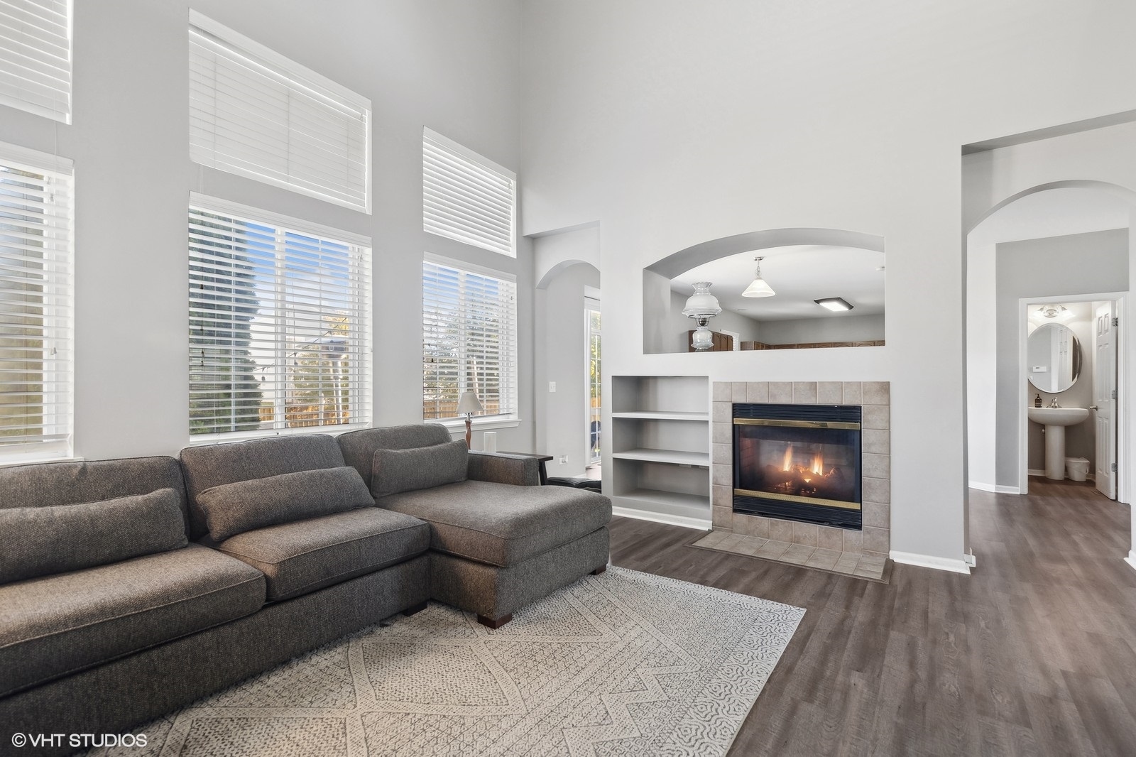 9740 Newton Road Huntley, IL 60142 - Photo 8 of 20 a living room with furniture and a fireplace