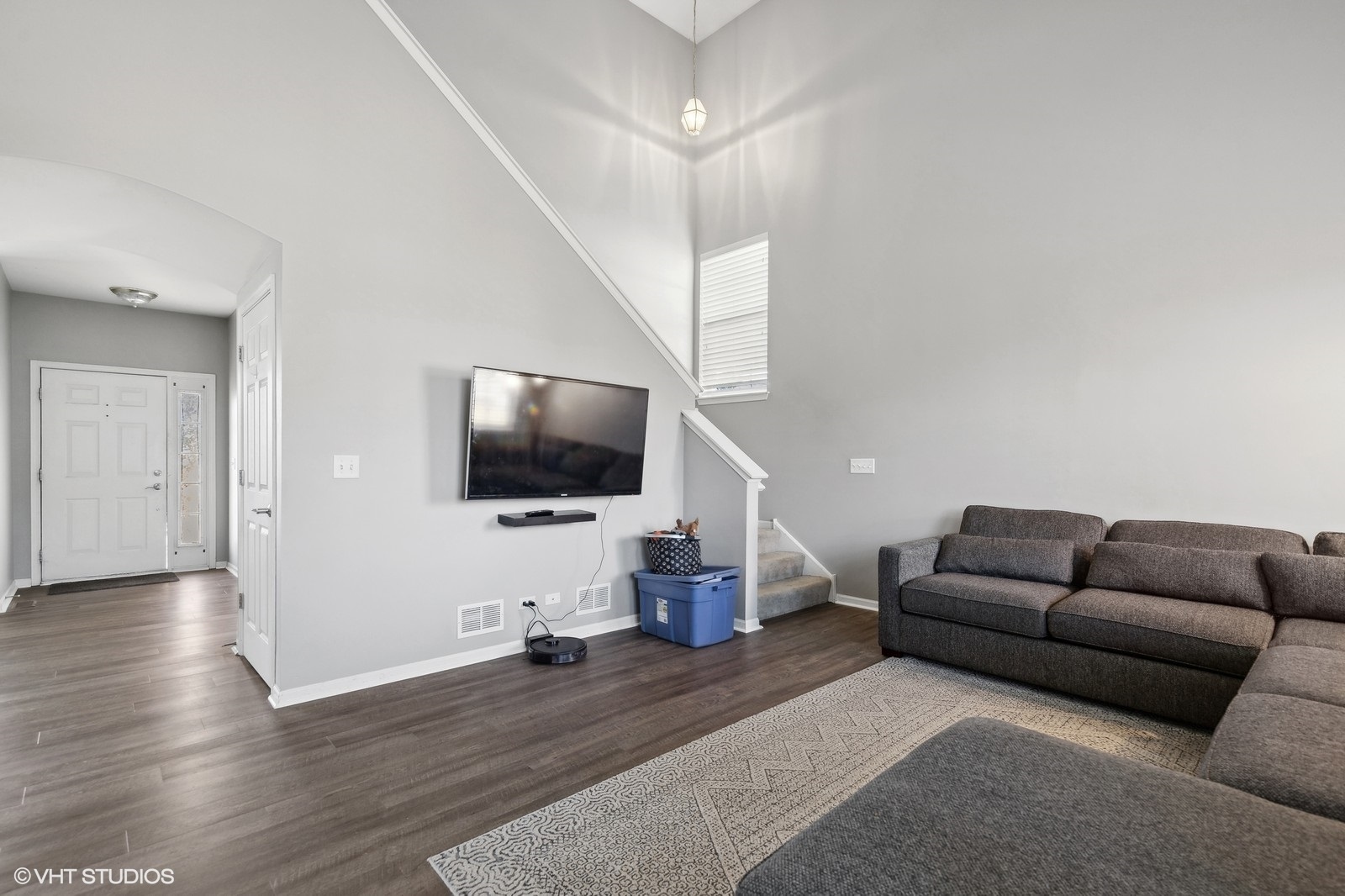9740 Newton Road Huntley, IL 60142 - Photo 9 of 20 a living room with furniture and a flat screen tv