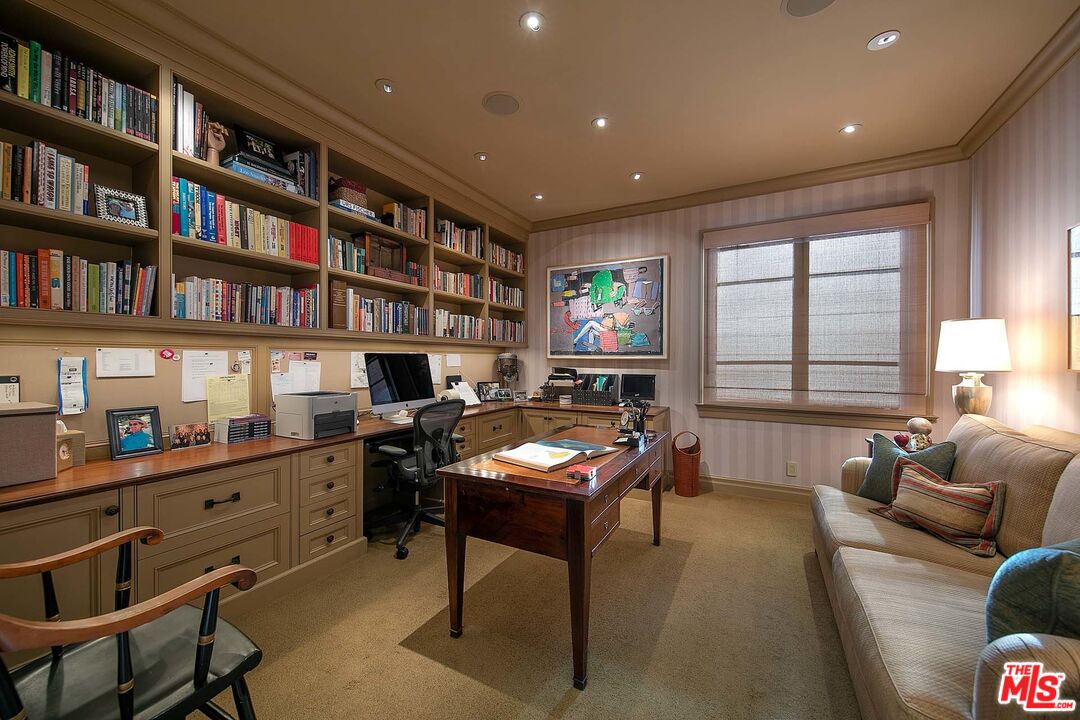 531 Barnaby Road Los Angeles, CA 90077 - Photo 17 of 28 a livingroom with workspace or window and a couch